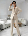 BEIGE SUIT WITH FEATHERS