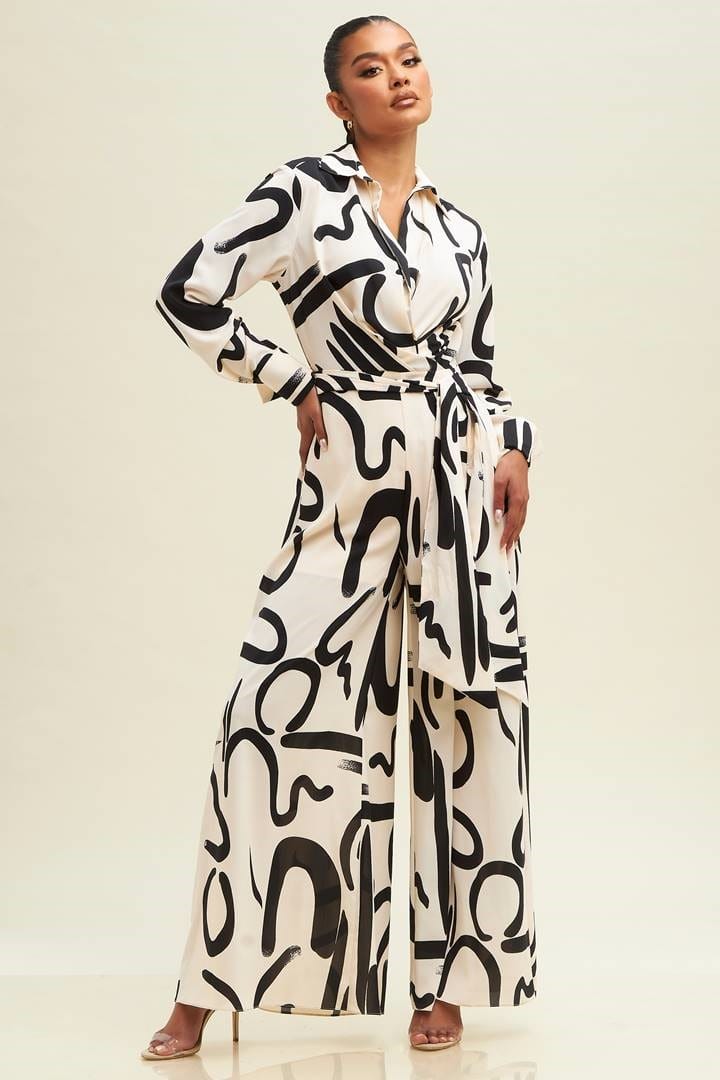 BLACK AND WHITE PRINT FLAIR STYLE JUMPSUIT