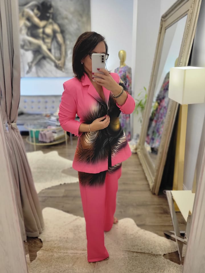 PINK SUIT WITH FEATHERS