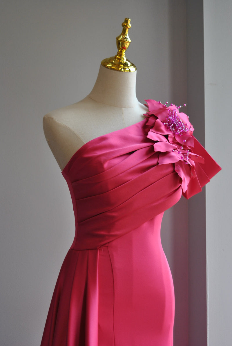 FUCHSIA LONG EVENING GOWN WITH SIDE FLOWER Le Obsession Boutique FUCHSIA LONG EVENING GOWN WITH SIDE FLOWER Le Obsession Boutique