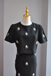 BLACK SET OF MIDI SKIRT AND CROPPED TOP WITH CRYSTALS