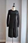 CLEARANCE - BLACK SWEATER DRESS WITH FAUX LEATHER PLEATED SLIP