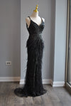 BLACK EVENING GOWN WITH FEATHERS AND RHINESTONES