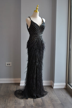 BLACK EVENING GOWN WITH FEATHERS AND RHINESTONES