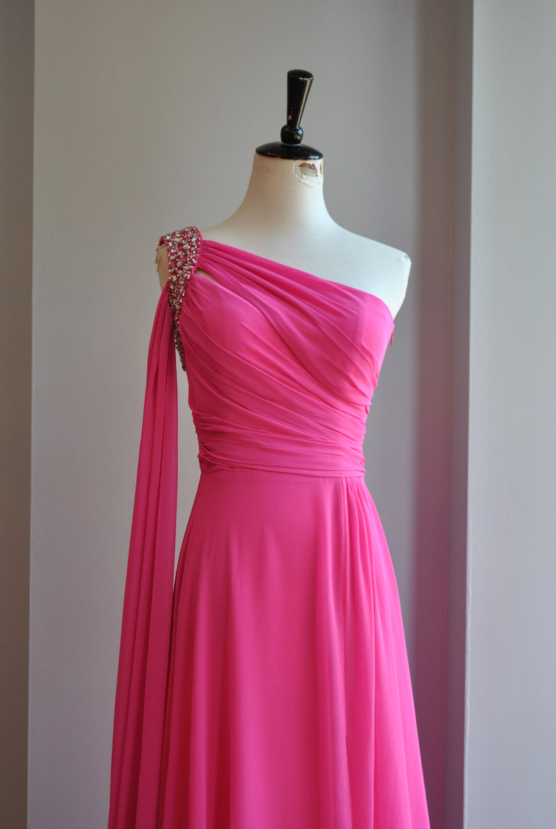 HOT PINK ASYMMETRIC EVENING GOWN WITH CRYSTALS HOT PINK ASYMMETRIC EVENING GOWN WITH CRYSTALS