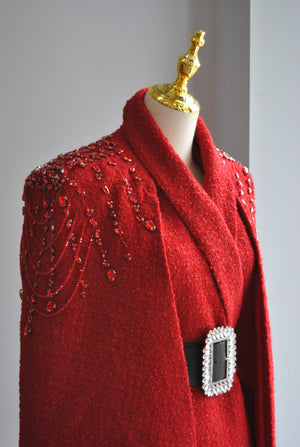 RED PONCHO WITH CRYSTALS AND A BELT