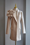LIGHT BEIGE SPRING COAT WITH A FLOWER