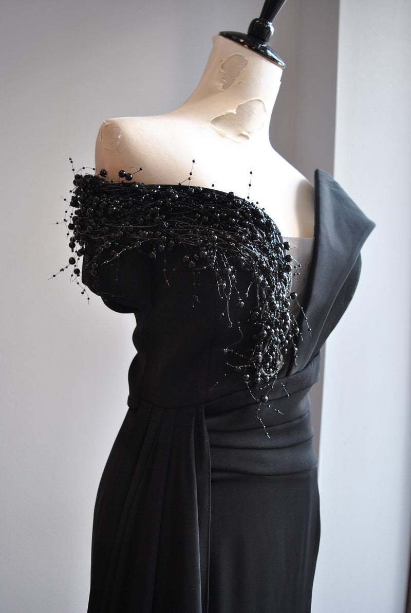 BLACK EVENING GOWN WITH SIDE PEARLS