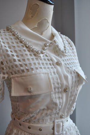 WHITE FIT AND FLAIR DRESS WITH PEARLS AND RHINESTONES