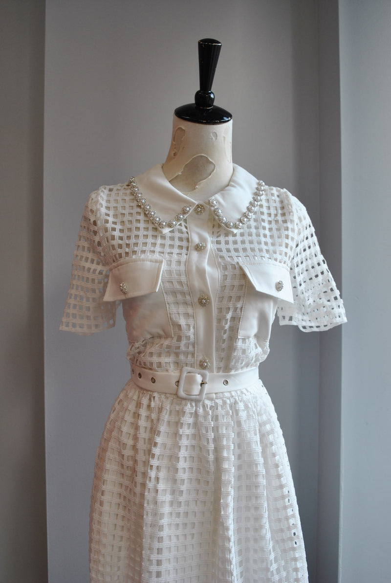 WHITE FIT AND FLAIR DRESS WITH PEARLS AND RHINESTONES