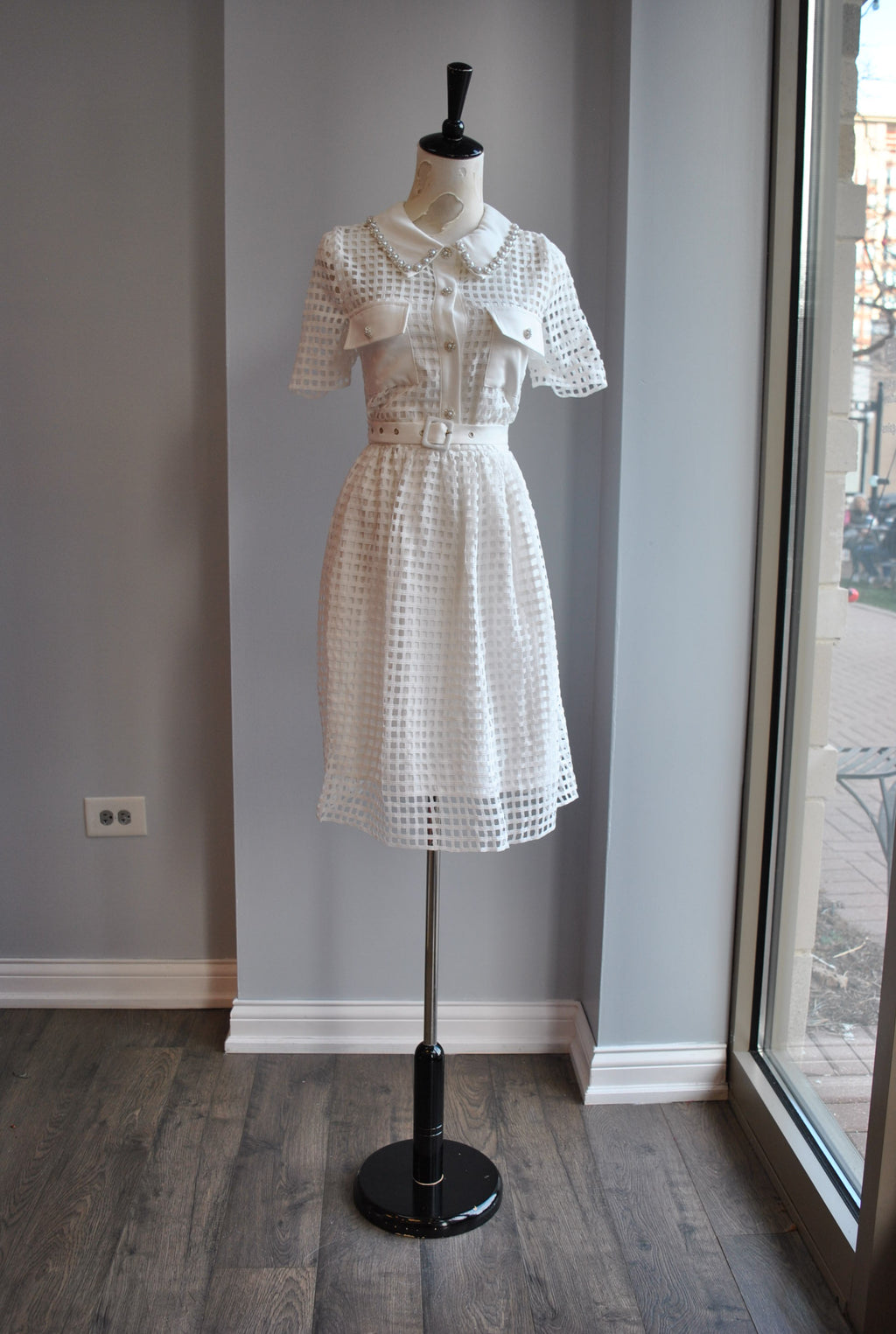 WHITE FIT AND FLAIR DRESS WITH PEARLS AND RHINESTONES