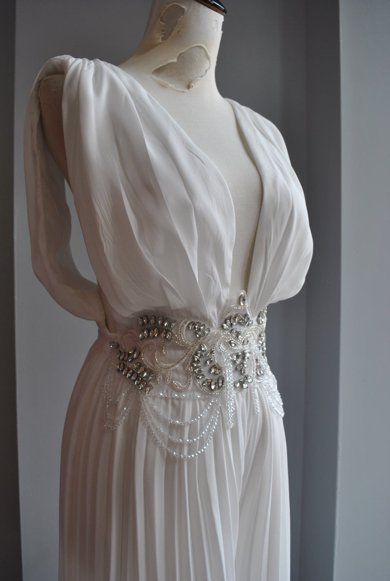 WHITE PLEATED JUMPSUIT WITH CRYSTALS