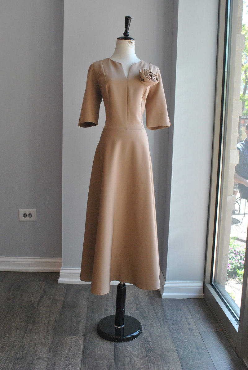 CARAMEL FIT AND FLAIR MIDI DRESS WITH A FLOWER