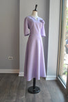 LAVENDER FIT AND FLAIR MIDI DRESS WITH A FLOWER