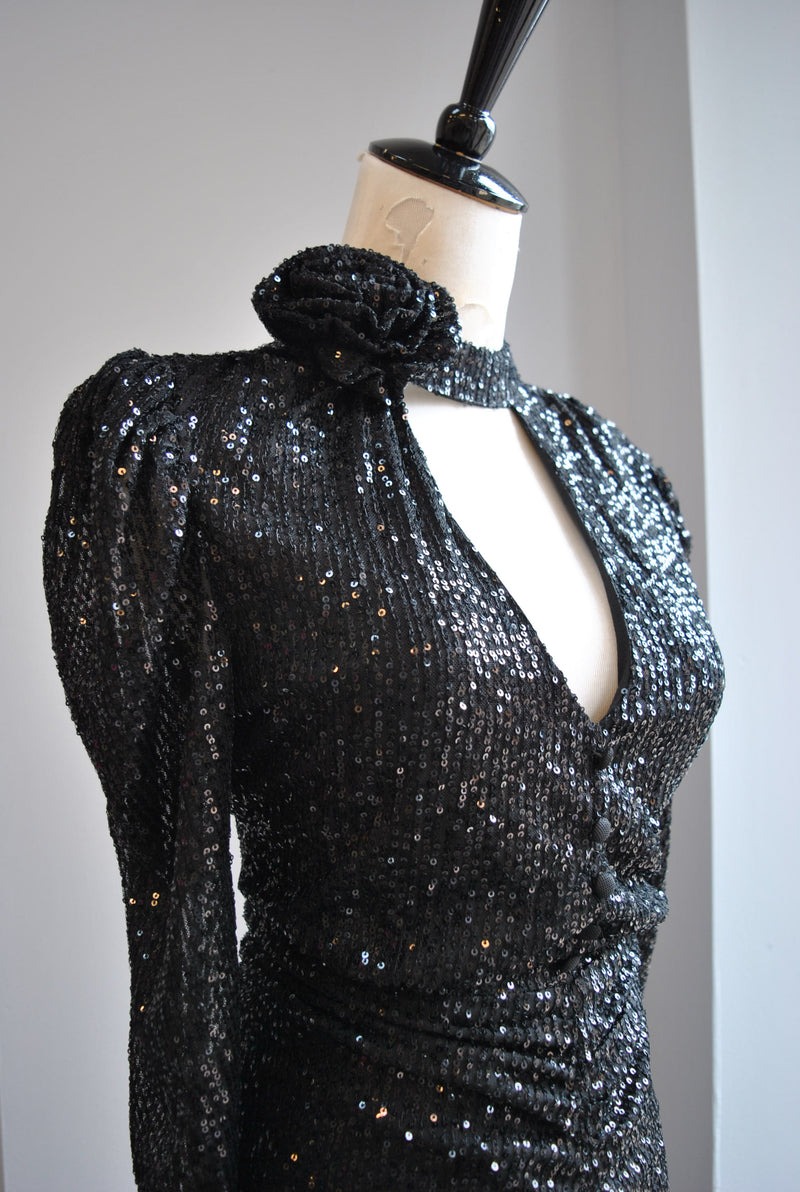 BLACK SEQUIN DRESS WITH A FLOWER