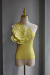 YELLOW ASYMMETRIC TOP WITH A FLOWER