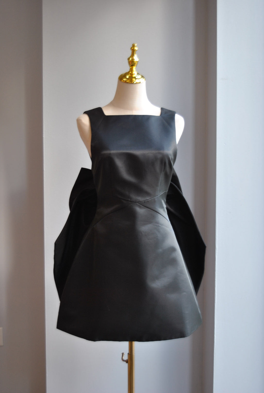 BLACK SATIN MINI DRESS WITH OPEN BACK AND A BOW