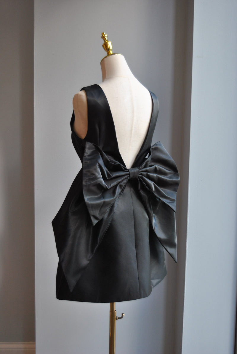BLACK SATIN MINI DRESS WITH OPEN BACK AND A BOW