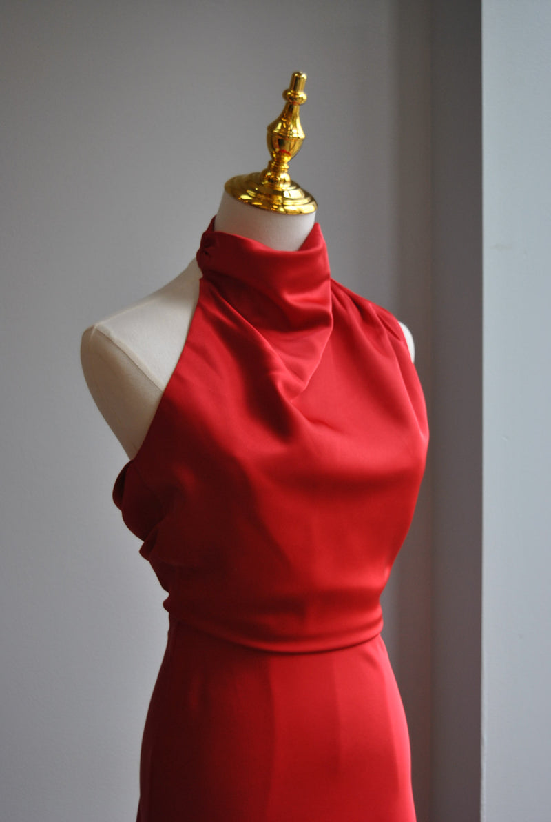 RED SILKY MIDI DRESS WITH HALTER TOP AND ASYMMETRIC OPEN BACK