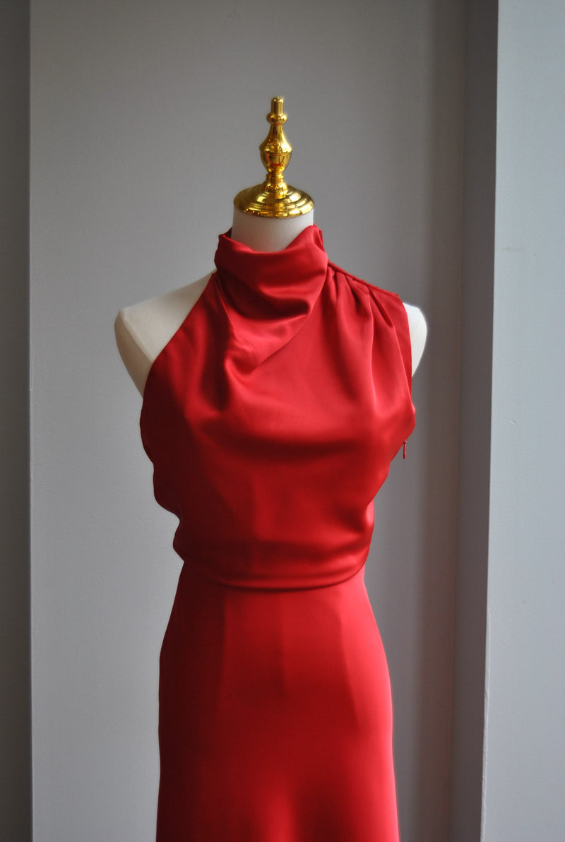 RED SILKY MIDI DRESS WITH HALTER TOP AND ASYMMETRIC OPEN BACK