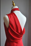 RED SILKY MIDI DRESS WITH HALTER TOP AND ASYMMETRIC OPEN BACK
