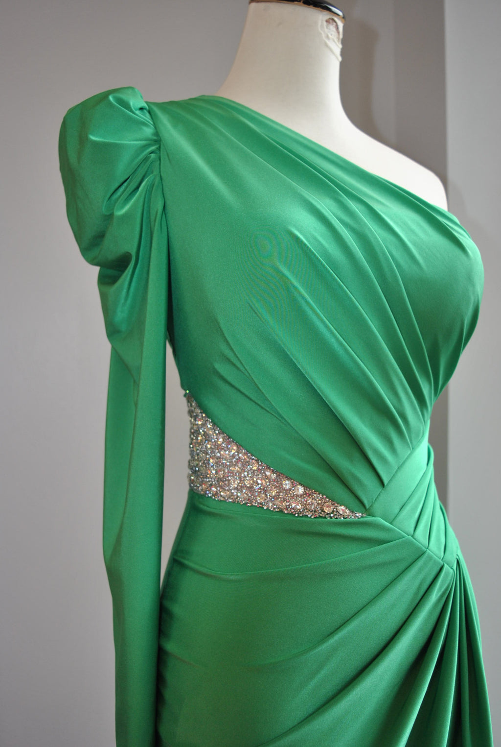 GREEN LONG EVENING ASYMMETRIC GOWN WITH SIDE CRYSTALS