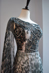BLACK AND WHITE PRINT PLEATED LONG EVENING GOWN WITH THE EMELLISHMENT