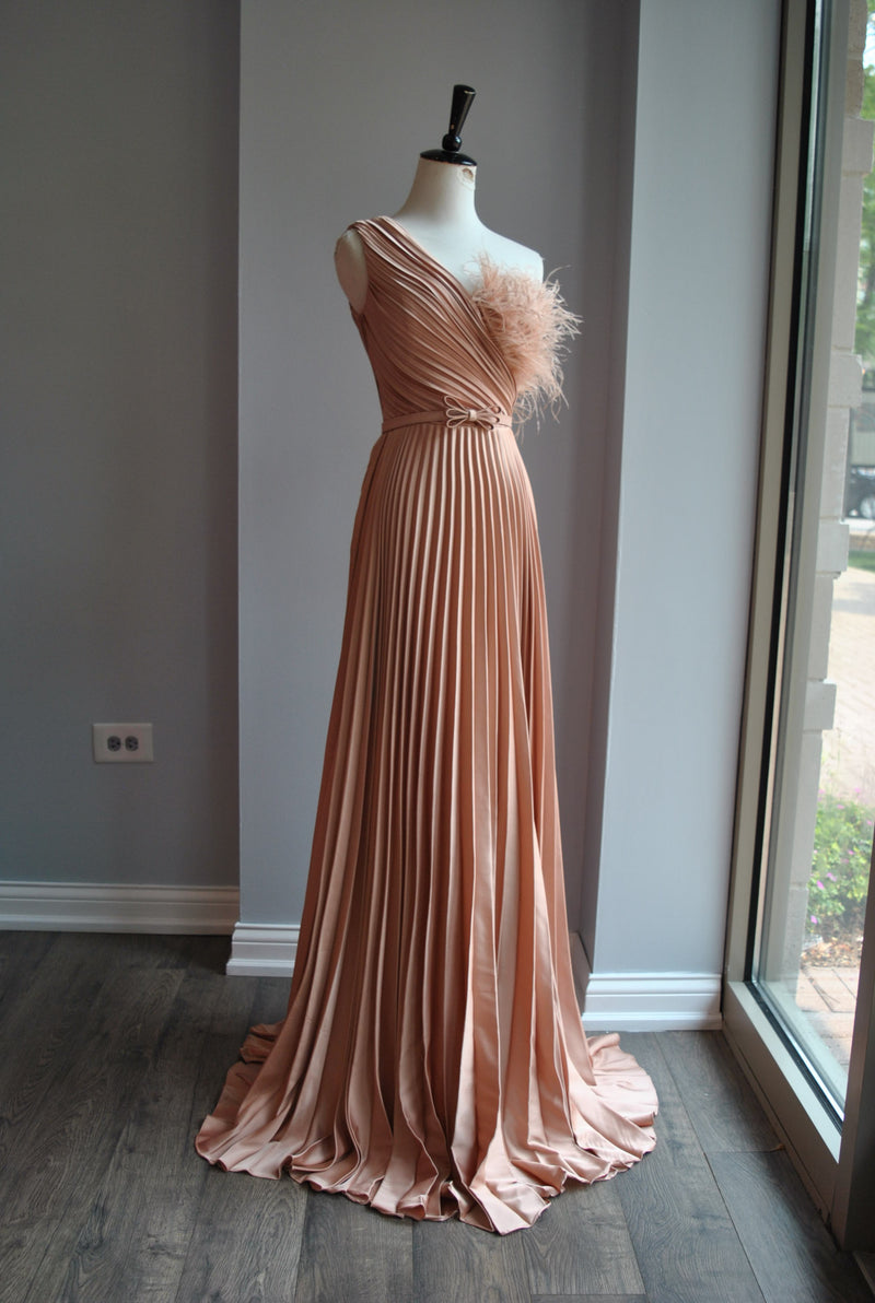 ROSE GOLD PLEATED EVENING GOWN WITH FEATHERS