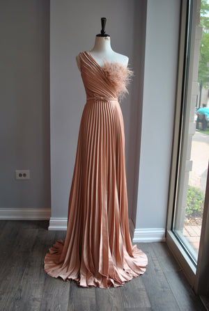 ROSE GOLD PLEATED EVENING GOWN WITH FEATHERS