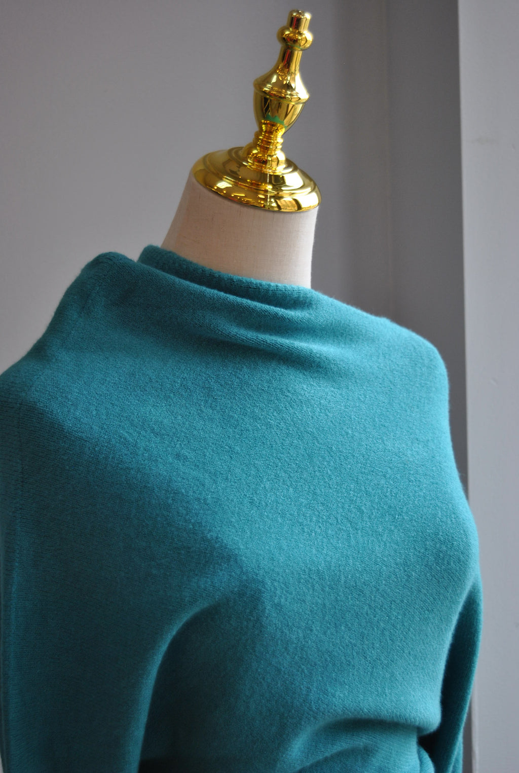 TEAL ASYMMETRIC SWEATER TOP