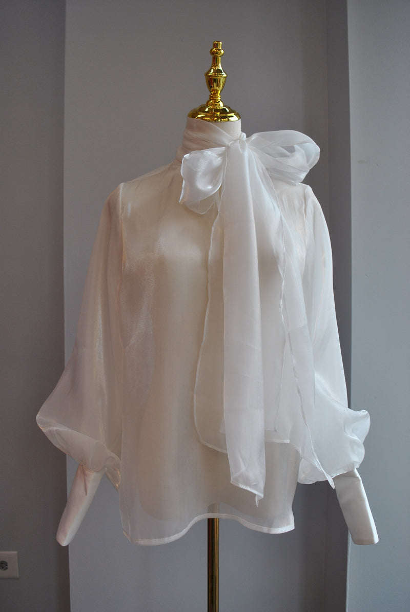 SHEER WHITE BLOUSE WITH STATEMENT SLEEVES AND TIE NECK