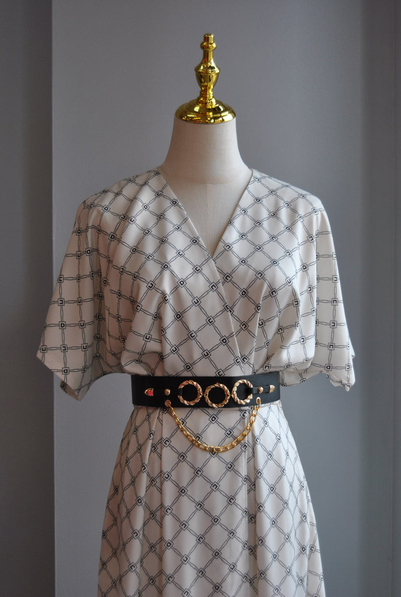BLACK AND WHITE MIDI SUMMER DRESS WITH SIDE POCKETS AND A BELT
