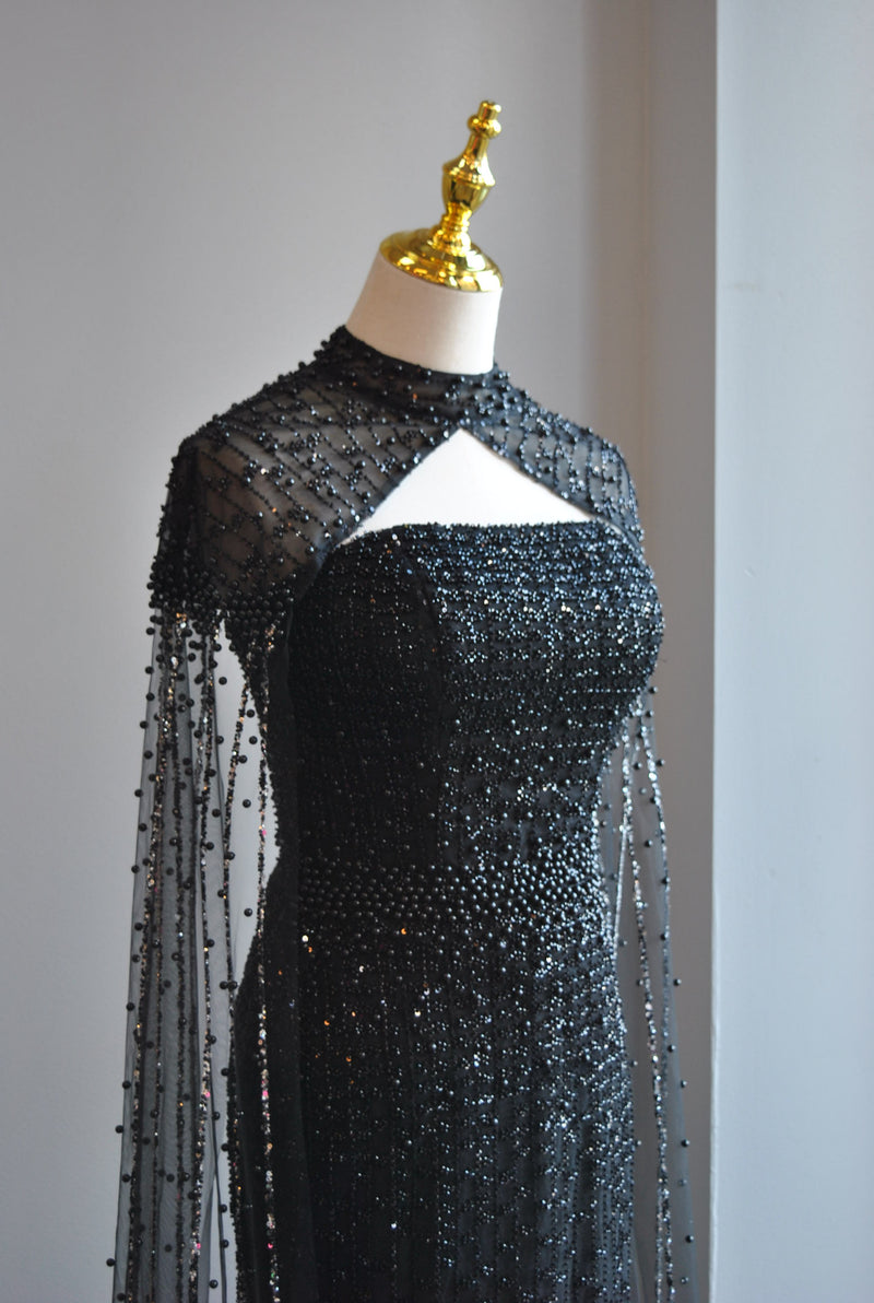 BLACK BEADED LONG EVENING GOWN WITH A CAPE Le Obsession Boutique BLACK BEADED LONG EVENING GOWN WITH A CAPE Le Obsession Boutique