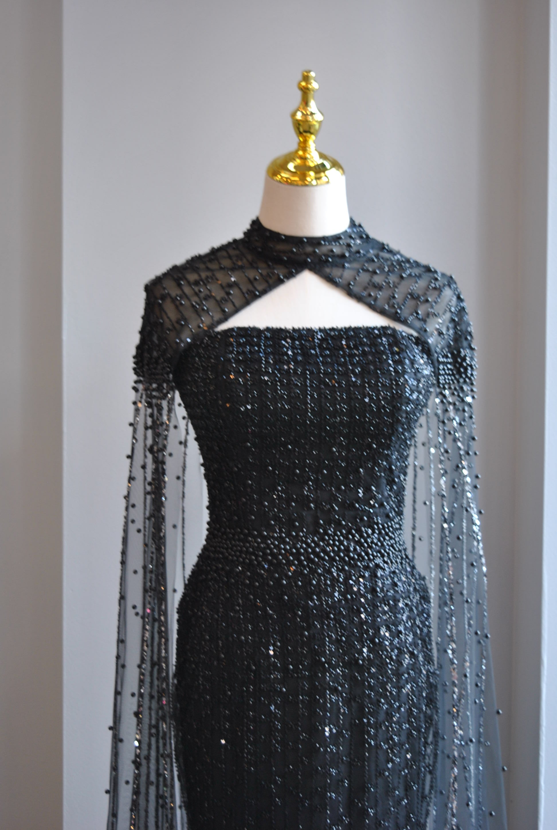 BLACK BEADED LONG EVENING GOWN WITH A CAPE Le Obsession Boutique BLACK BEADED LONG EVENING GOWN WITH A CAPE Le Obsession Boutique