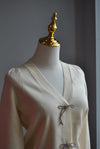 VANILLA SWEATER WITH CRYSTAL BOWS
