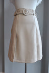 SAND COLOR FAUX LEATHER SKIRT WITH A BELT