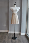 SAND COLOR FAUX LEATHER SKIRT WITH A BELT