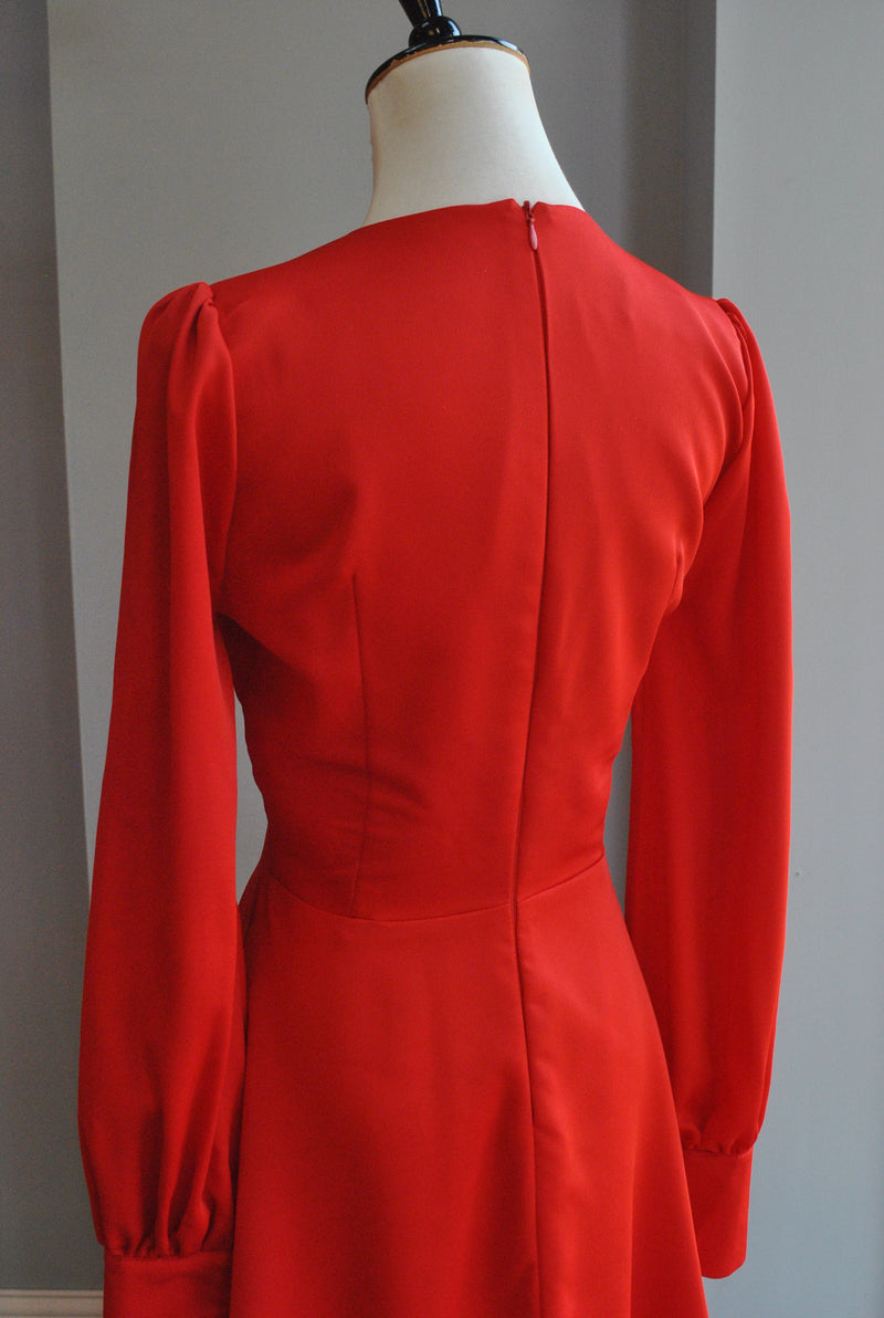 RED A-LINE DRESS WITH A PEEK A BOO