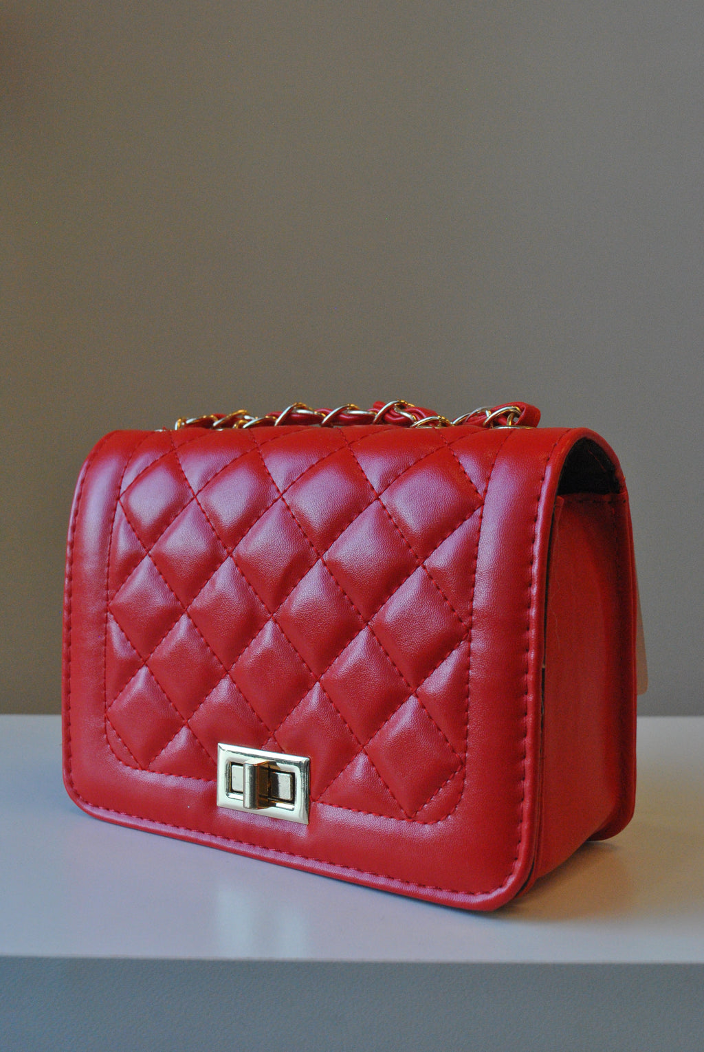 RED SMALL GUILTED CROSSBODY BAG