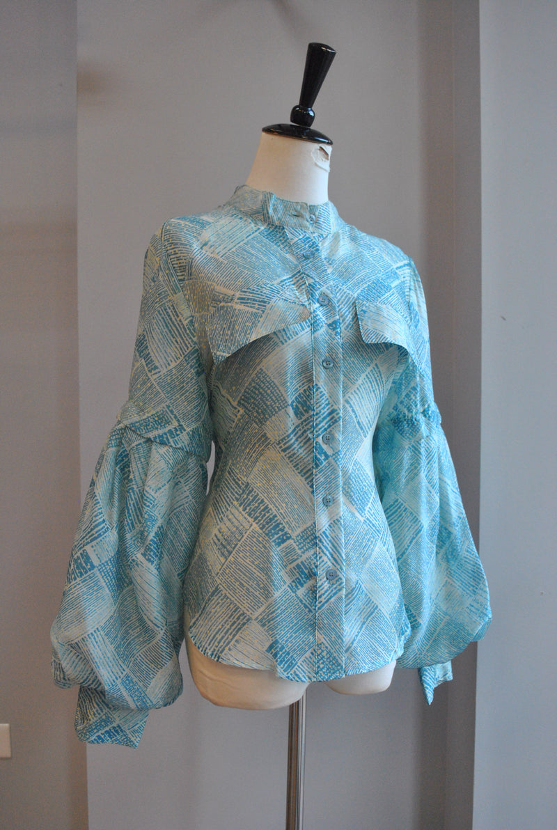 CLEARANCE - LIGHT BLUE TOP WITH STATEMENT SLEEVES