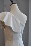 CLEARANCE - WHITE ASYMMETRIC DRESS WITH A RUFFLE