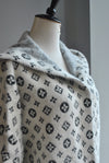 VANILLA AND BLACK PRINT ALPAKA COAT WITH A HOODIE