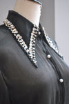 BLACK SHEER BLOUSE WITH CRYSTALS AND FEATHERS DETAIL