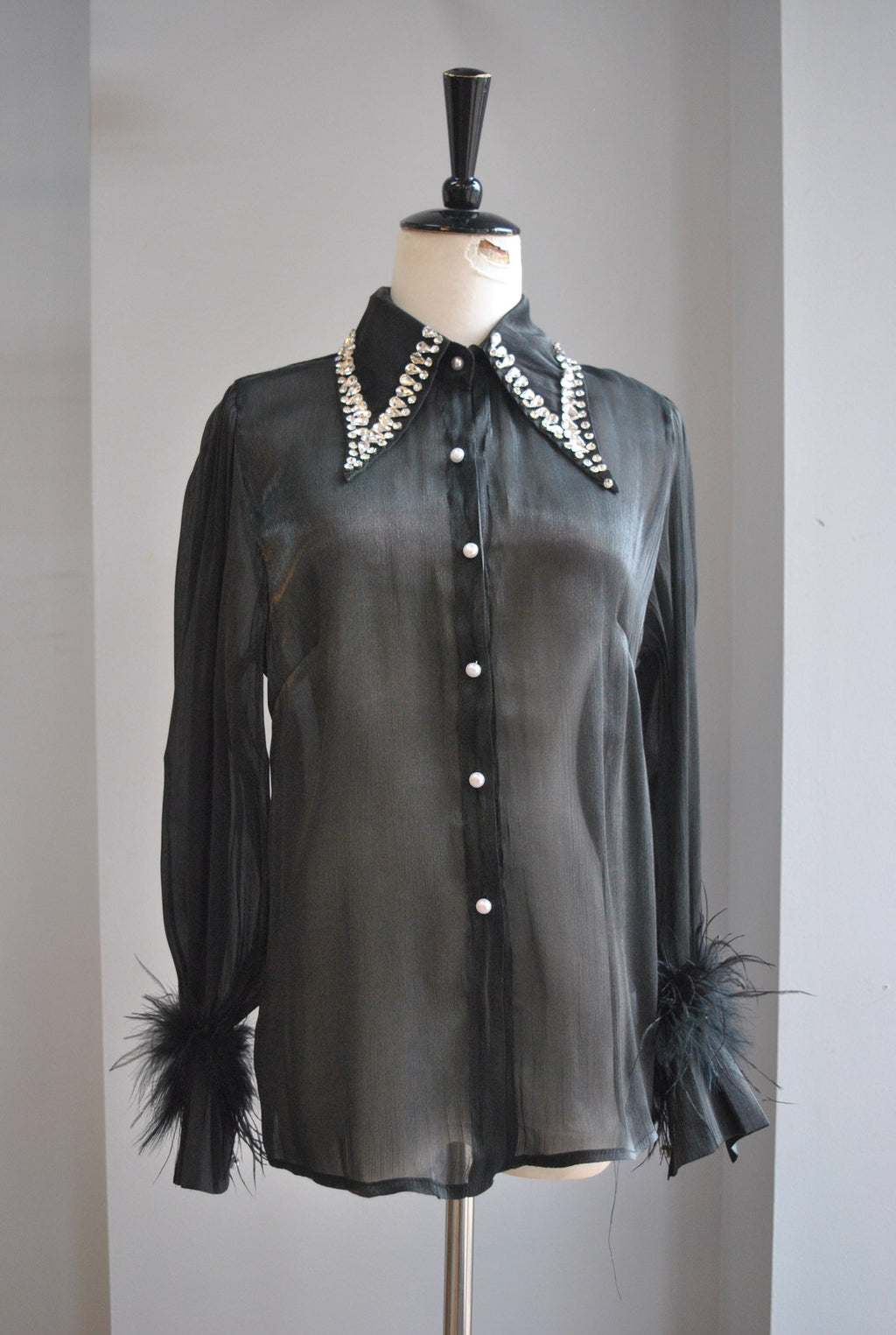 BLACK SHEER BLOUSE WITH CRYSTALS AND FEATHERS DETAIL