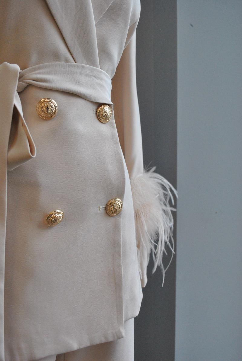BEIGE SUIT WITH FEATHERS