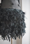 BLACK JACKET DRESS WITH A CRYSTAL BELT AND FEATHERS