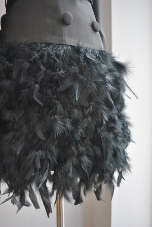 BLACK JACKET DRESS WITH A CRYSTAL BELT AND FEATHERS