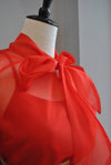 RED SHEER TOP WITH A SIDE BOW