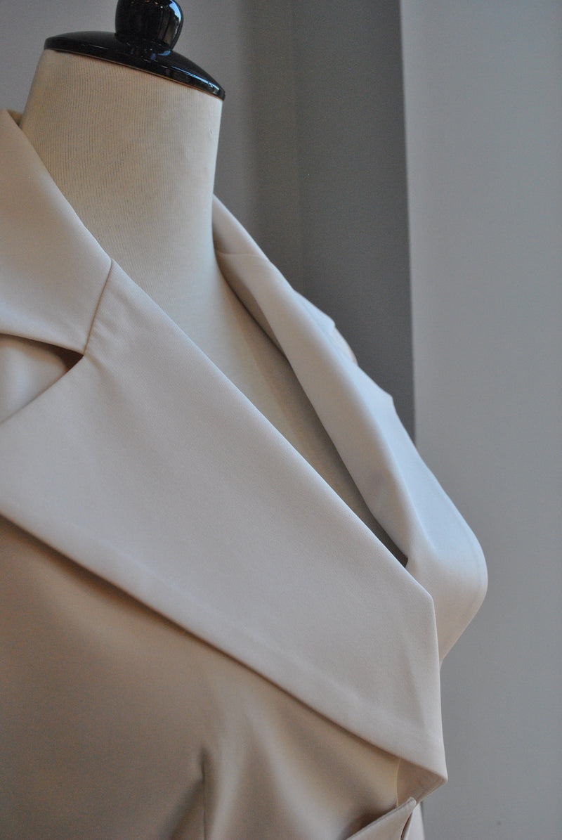 BEIGE JACKET WITH A BELT