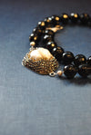 BLACK ONYX AND MOTHER OF PEARLS ASYMMETRIC NECKLACE